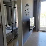 6th Floor Apartments, Apartment *